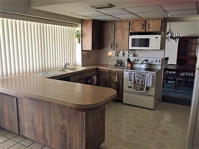 Kitchen looks out to the pool
