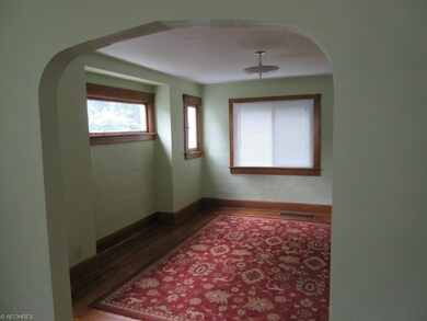 Large formal dining room with original woodwork an