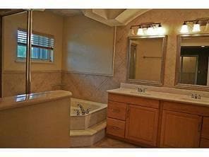 Master Bathroom with Spa Tub and Separate Shower