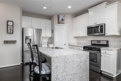 Sleek modern kitchen with quartz countertops, quar