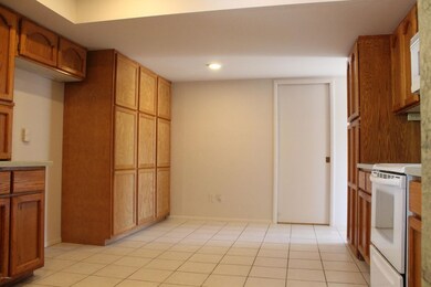 Eat in area and pantry cabinets