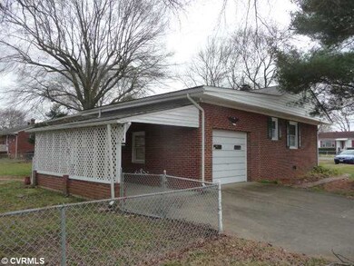 Exterior Back - Drive-in garage or carport keeps y