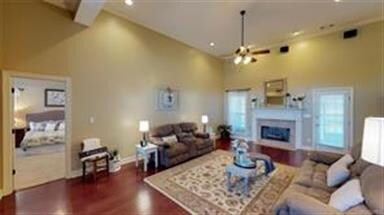 It also features a cozy fireplace and a surround s