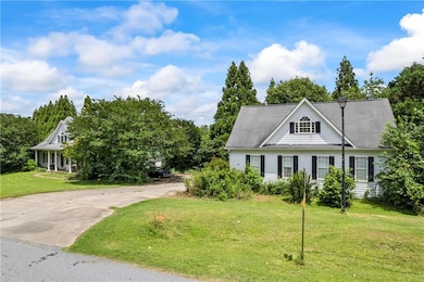 View of front of house featuring a front lawn