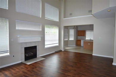 Large living room with soaring high ceilings, open to kitchen, 4 bedroom, 2.5 baths, Klein Schools, 21147 Covington Bridge Dr., Spring, Tx 77338