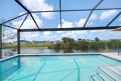 View of pool with glass enclosure, a water view, a