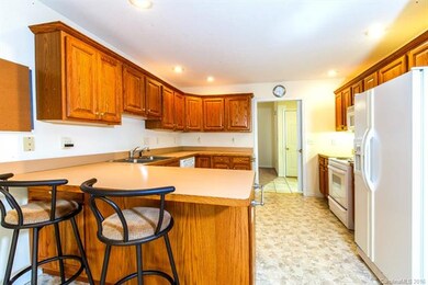 Family sized Kitchen has breakfast bar