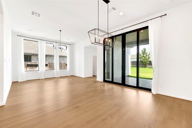 Open concept living room and dining area with ente
