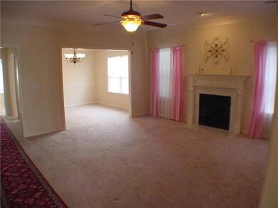 17 x 16 Great room with 10 ft ceiling--ceiling fan and fireplace with gas logs