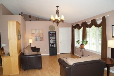 Living room with vaulted ceiling