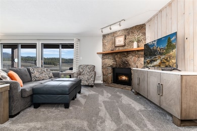 Large living room with fireplace.