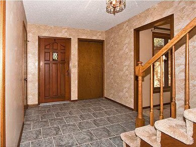 The grand foyer welcome you into this fabulous hom