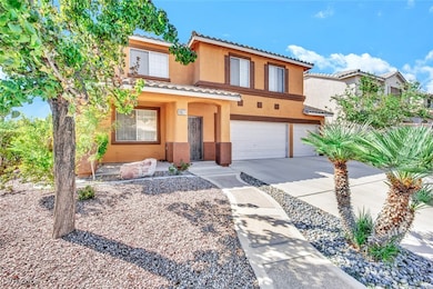 View of front of home featuring driveway, a garage, stucco siding, and a tiled roof
