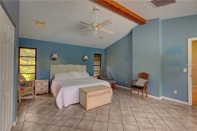 Oversized Master Suite with beamed ceilings and a 