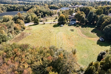 From above, it's breathtaking. On the ground, it's life-changing. Nearly 10 acres of open land, timeless charm, and unlimited potential-right in the heart of Durham. Wild Acres isn't just land... it's your legacy in the making.