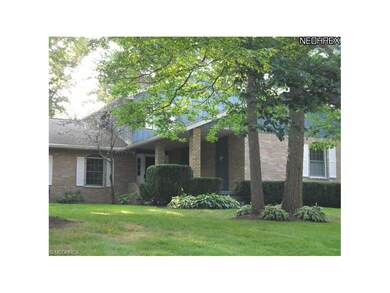 close up view of front porch brick and wood exteri