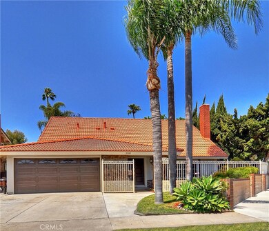 Gated Courtyard Entry, Red Tile Roof, Double Entry Doors