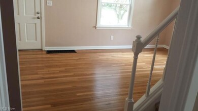 Living room with oak floors