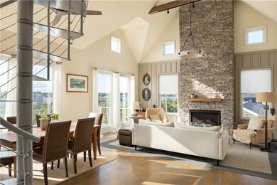 Living/Dining w/Water View; Sliders open to Upper