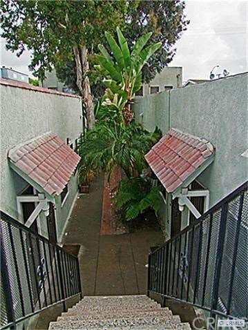 Stairs up to the opt floor apartments, one studio,