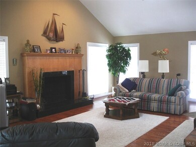 VAULTED CEILINGS, OVERSIZED WINDOWS, SOLID OAK FLO