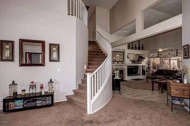 Two-Story Entry with Curved Staircase
