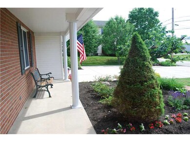 Exterior Front. The front porch welcomes your gues