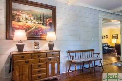Clapboard style wood details, heavy moldings, hard