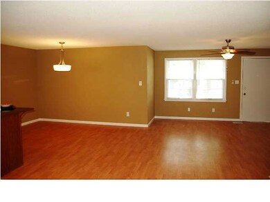 View of living room & dining area from kitchen