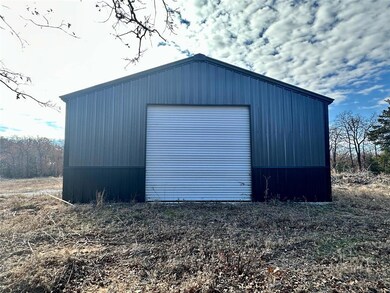 30x60x12 Shop Building with 3 large commercial doo