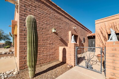 Front courtyard w/custom gate