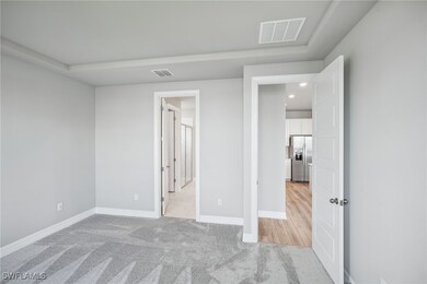 Photos are of a model home with the same floorplan