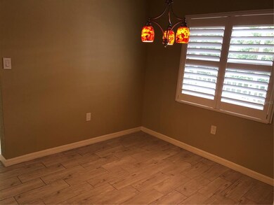 DINING AREA WITH PLANTATION SHUTTERS