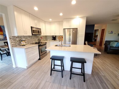 Updated kitchen with Island and breakfast bar