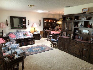 View from front entry to living room and dining ro