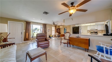 Great room opening to kitchen