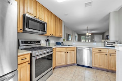 This kitchen features modern stainless steel appli