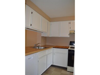 Charming kitchen includes refrigerator, gas range 