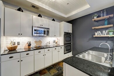 This modern kitchen features freshly painted cabin
