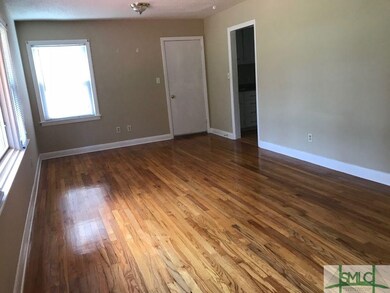 Living Room/Dining Room Combo.  Hardwood Floors, Insulated Windows.