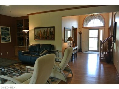 Gracious 2-story Foyer with newer hardwood floorin