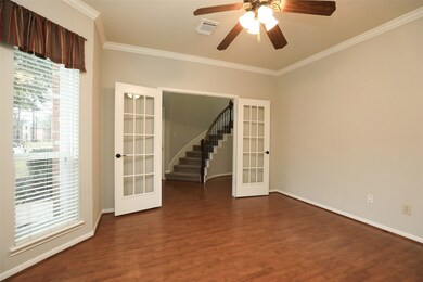 French door open to large office.