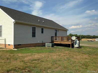 BACK OF HOUSE AND REAR DECK