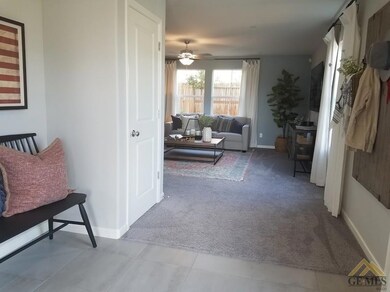 Photos of model home, not actual home. Entry.