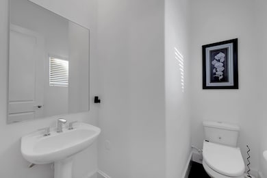 Guest 1/2 bath is located at the top of the stairs