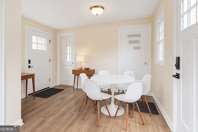 Virtually staged Foyer/Dining area