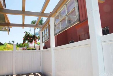 Side patio off of sun room adjacent to kitchen. Gr