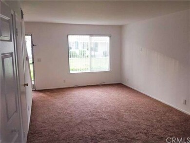 Nice size living room with view to greenbelt and e