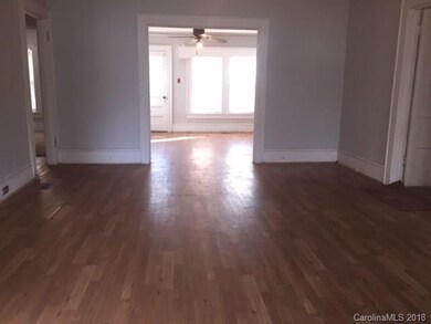 Front door view to living room and dining room.