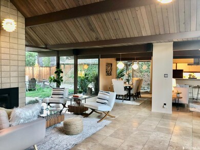 LIVING ROOM, DINING ROOM, FAMILY ROOM AND KITCHEN